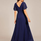Robe de soirée longue à col en V et appliques à la taille grande taille