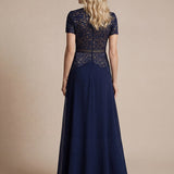 Robe longue à encolure ronde à manches courtes en sequins coupe évasée