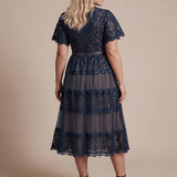 Robe en tulle A-line longueur thé à manches courtes décolleté en V avec sequins