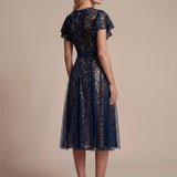 Robe midi évasée en tulle avec manches courtes décolleté en V et volants