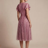 Robe midi évasée en tulle avec manches courtes décolleté en V et volants