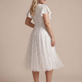 Robe midi évasée en tulle avec manches courtes décolleté en V et volants